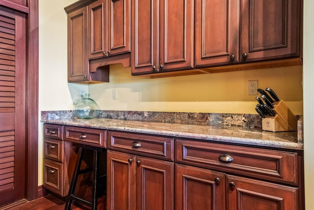 kitchen with light stone countertops