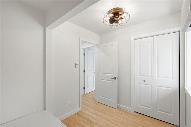 2825 Kauhale St, Kihei, HI 96753 - corridor featuring light wood finished floors and baseboards