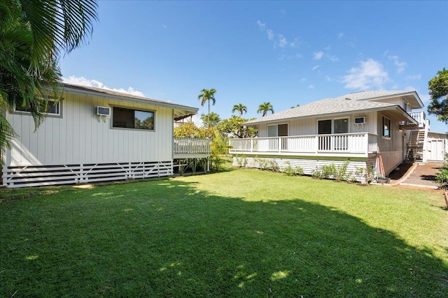 2825 Kauhale St, Kihei, HI 96753 - view of grassy yard featuring a wooden deck