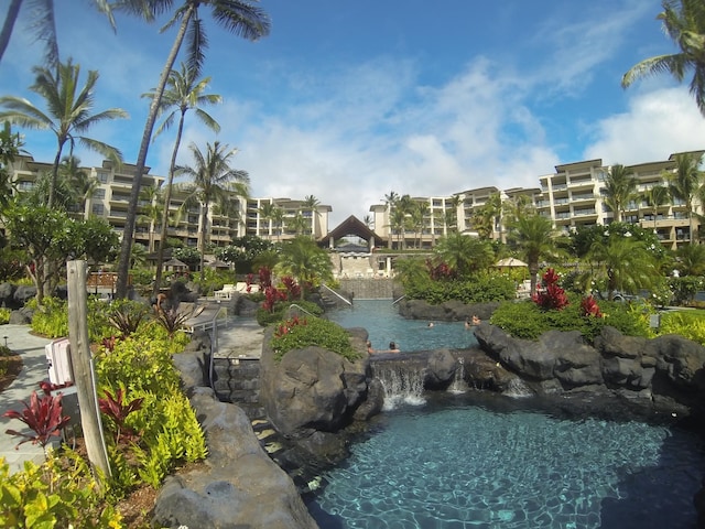 view of property's community with a swimming pool