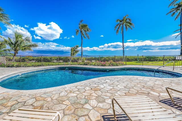 view of swimming pool featuring a patio