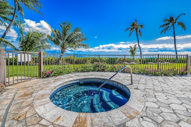 view of swimming pool with a patio area and an in ground hot tub