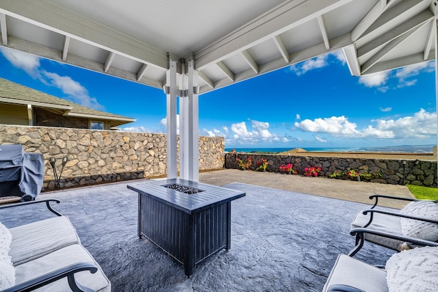 view of patio featuring a fire pit and area for grilling