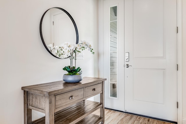 foyer with light wood-type flooring