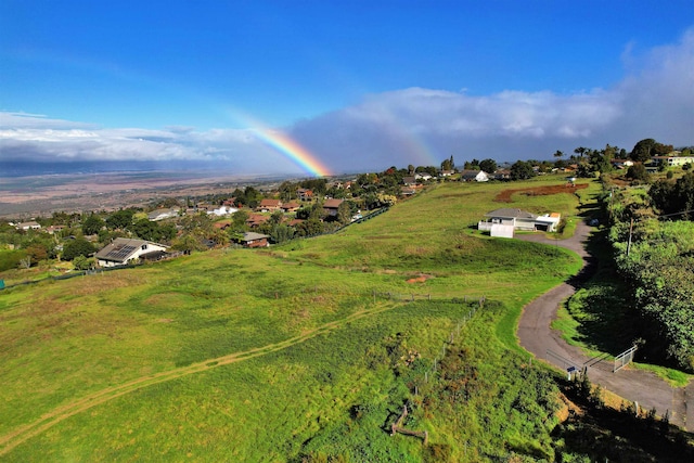 birds eye view of property featuring a rural view