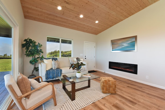 living room with light hardwood / wood-style floors, vaulted ceiling, and wood ceiling