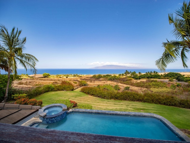 view of swimming pool with an in ground hot tub and a lawn