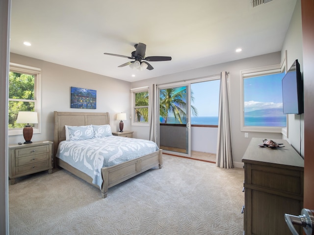 carpeted bedroom featuring access to outside and ceiling fan