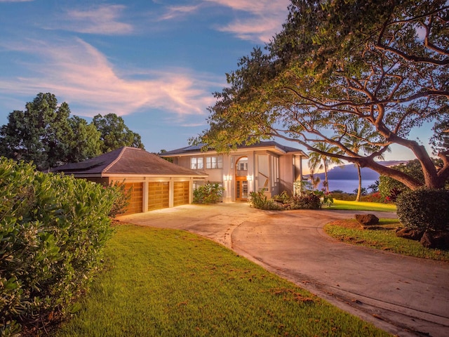 view of front of home featuring a yard