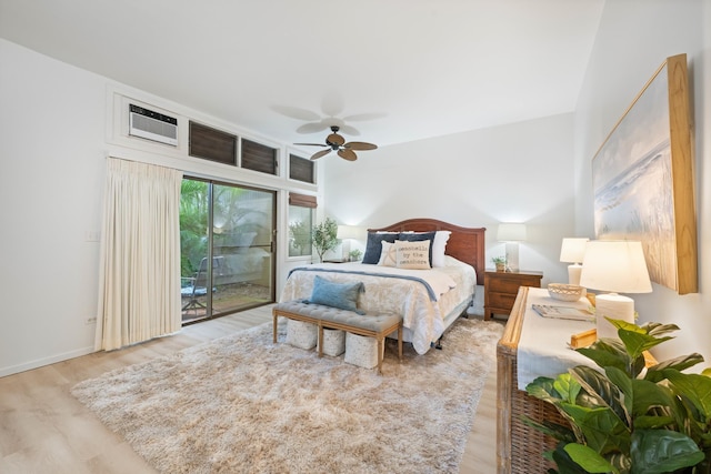 bedroom featuring wood finished floors, a ceiling fan, access to exterior, and baseboards