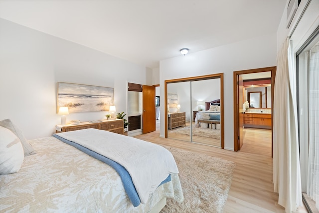 bedroom with light wood-style floors