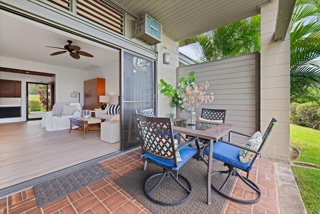 view of patio with ceiling fan and outdoor dining space