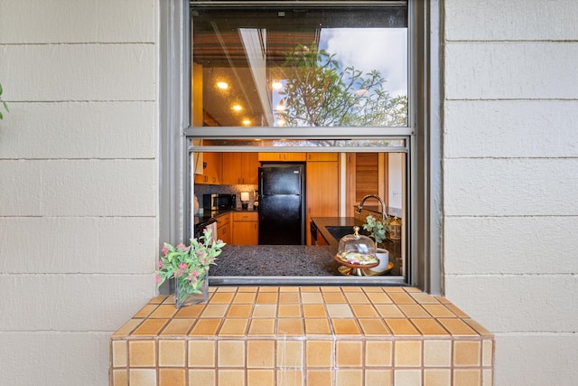 doorway to property featuring a sink