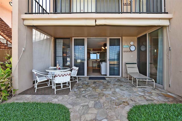 view of patio with a balcony