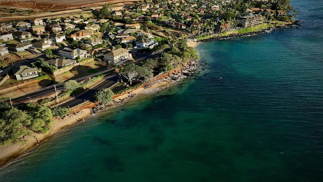 aerial view featuring a water view and a beach view