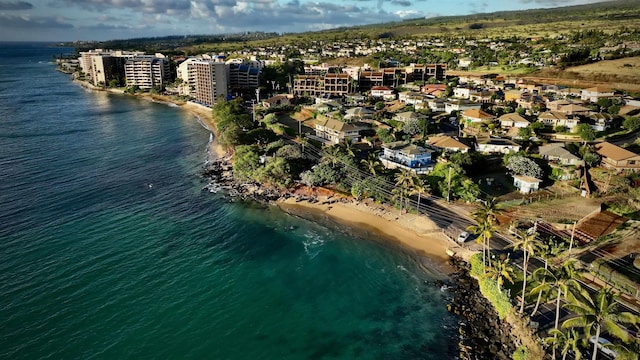 aerial view featuring a water view and a beach view