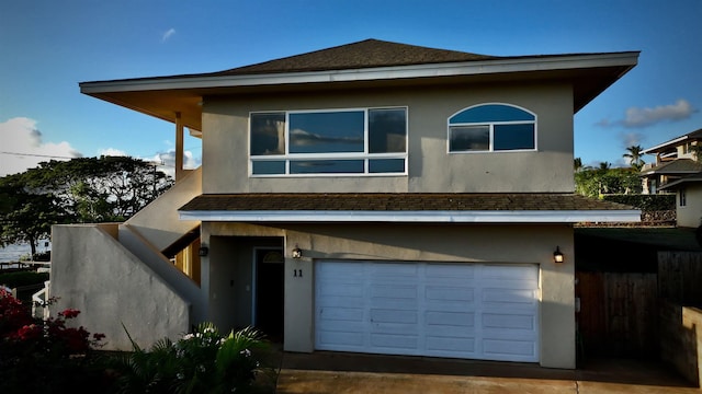 view of front of property featuring a garage