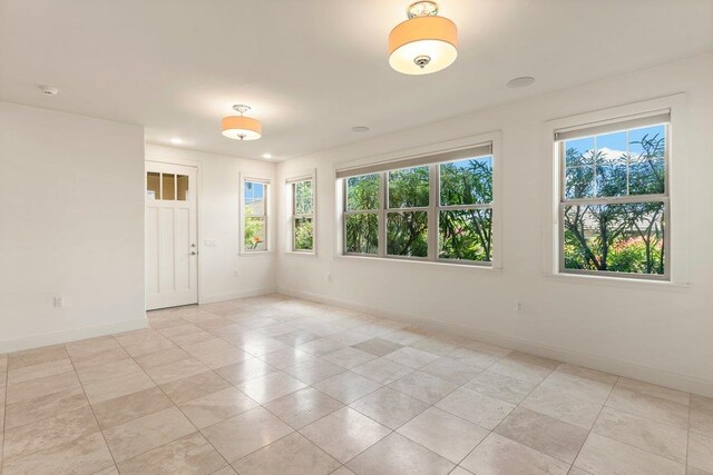 view of tiled empty room