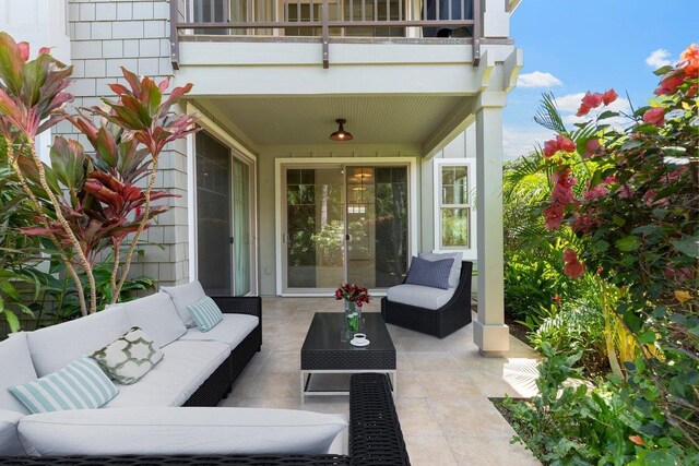 view of patio / terrace with a balcony and an outdoor living space