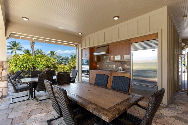 dining space with sink