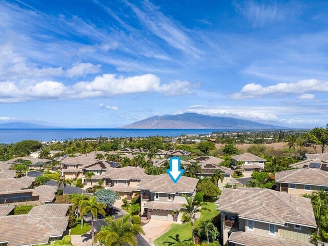 bird's eye view featuring a water and mountain view