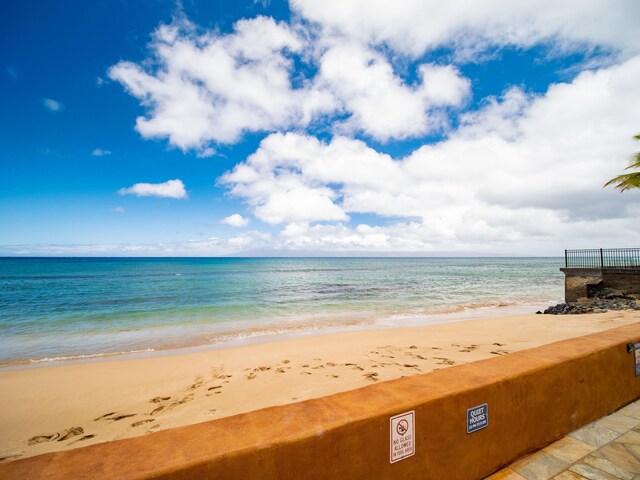 property view of water with a beach view