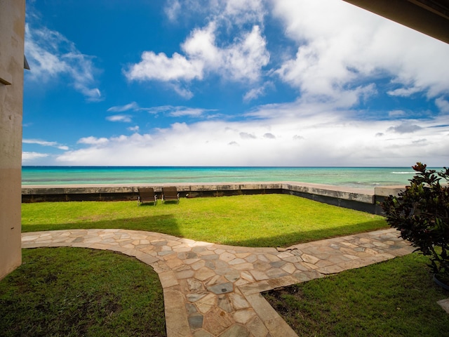 view of patio / terrace with a water view