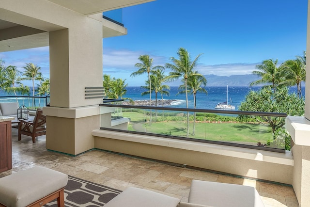 exterior space with a water and mountain view