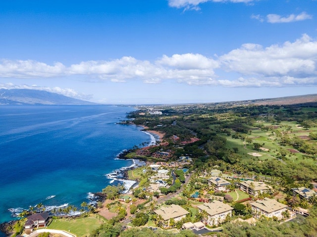 drone / aerial view featuring a water and mountain view