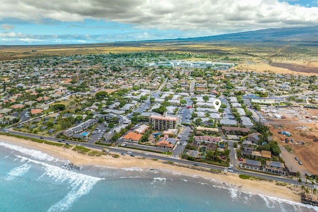 bird's eye view with a view of the beach and a water view