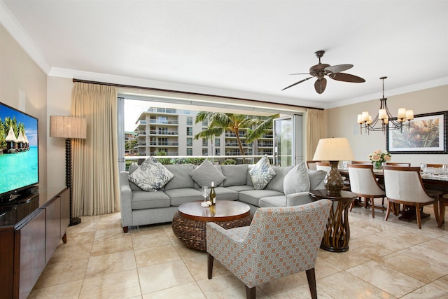 living room featuring crown molding and ceiling fan with notable chandelier