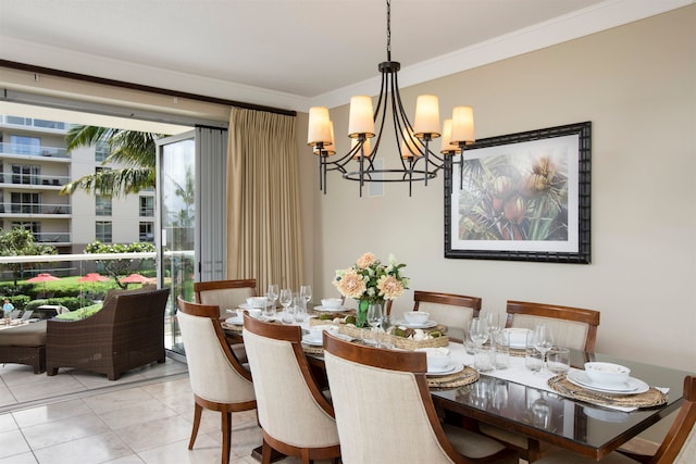 dining room with an inviting chandelier, crown molding, and light tile patterned flooring