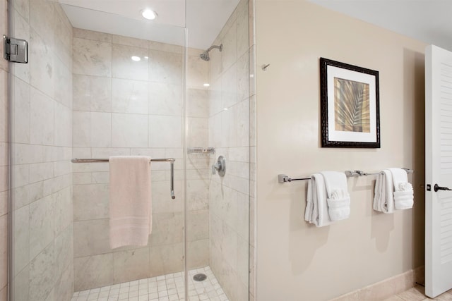 bathroom featuring an enclosed shower