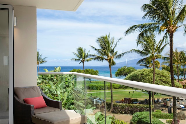 balcony featuring a water view