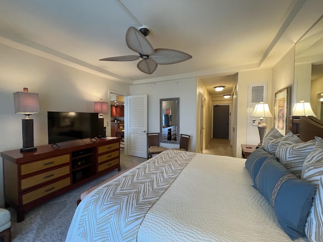 bedroom featuring ceiling fan and carpet floors