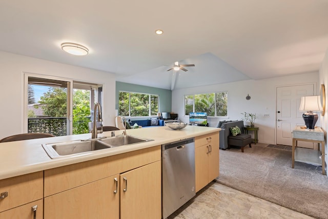 kitchen featuring vaulted ceiling, dishwasher, sink, ceiling fan, and light brown cabinetry