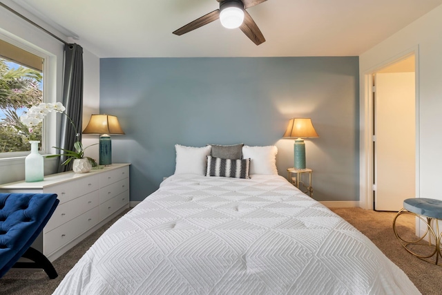 carpeted bedroom featuring ceiling fan