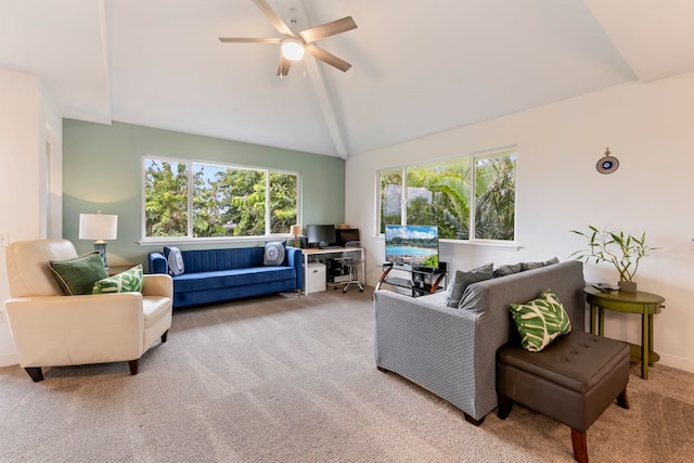 carpeted living room featuring ceiling fan and lofted ceiling