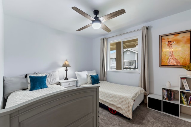 carpeted bedroom featuring ceiling fan