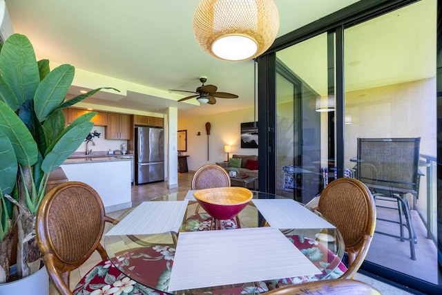 dining room featuring ceiling fan