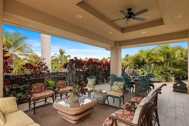 view of patio / terrace featuring ceiling fan