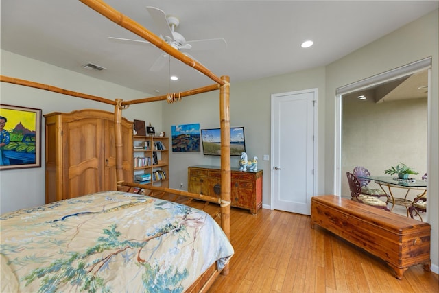 bedroom featuring ceiling fan and light hardwood / wood-style floors