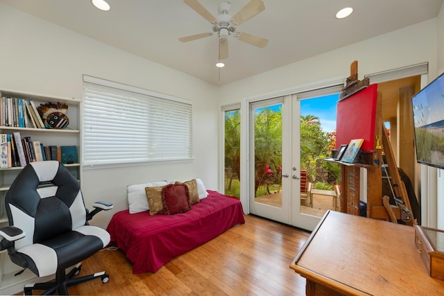 interior space with french doors, ceiling fan, and light hardwood / wood-style flooring