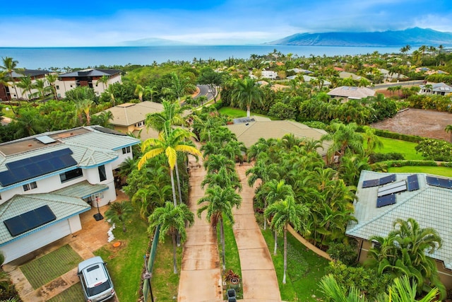 aerial view featuring a water and mountain view