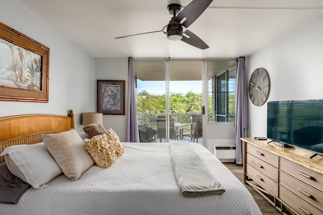 bedroom with ceiling fan, multiple windows, access to outside, and dark hardwood / wood-style floors