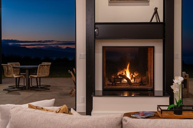 interior space featuring an outdoor fireplace
