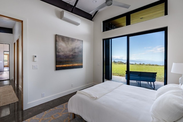 bedroom with access to exterior and an AC wall unit
