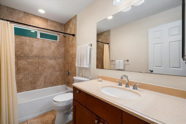 full bathroom featuring vanity, tile patterned floors, shower / bath combination with curtain, and toilet