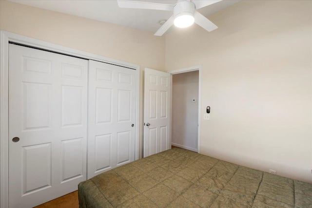 unfurnished bedroom with a closet and ceiling fan