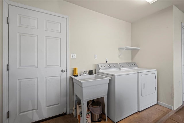 laundry room featuring sink and washing machine and dryer